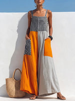 Vibrant Color-Block Jumpsuit – Striped Bodice & Flowing Wide-Leg Pants