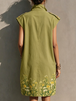 Sleeveless, Loose-fitting Dress Featuring A Stand Collar, Front Zipper, Shoulder Epaulettes, Large Patch Pockets, And A Floral Print At The Hem