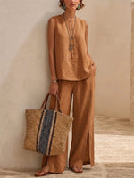 Minimalist, Relaxed-fit Textured Sleeveless Top With Partial Button Placket And Matching Draped, Side-slit Wide-leg Trousers Set