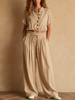 Two-piece Linen Set Featuring A Cropped, Half-button Top With A Stand Collar, Wooden Buttons, And Roll-up Sleeves, Paired With Wide-leg Trousers Featuring An Elastic Drawstring Waist