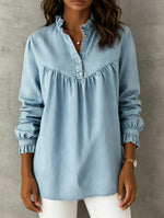 Loose-fit Denim Shirt Featuring A Stand Collar With Lettuce-edge Trim, A Partial Button Placket, Front Shirring, And Long Sleeves With Ruffled, Cinched Cuffs