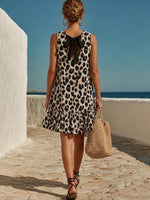 Leopard-print Sleeveless Round-neck Cropped Shift Dress With A Ruffled Hem