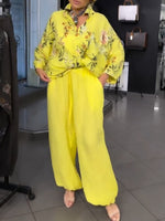 Two-piece Set Featuring A Loose, Casual Floral-print Linen-cotton Shirt And Solid-colored Trousers.