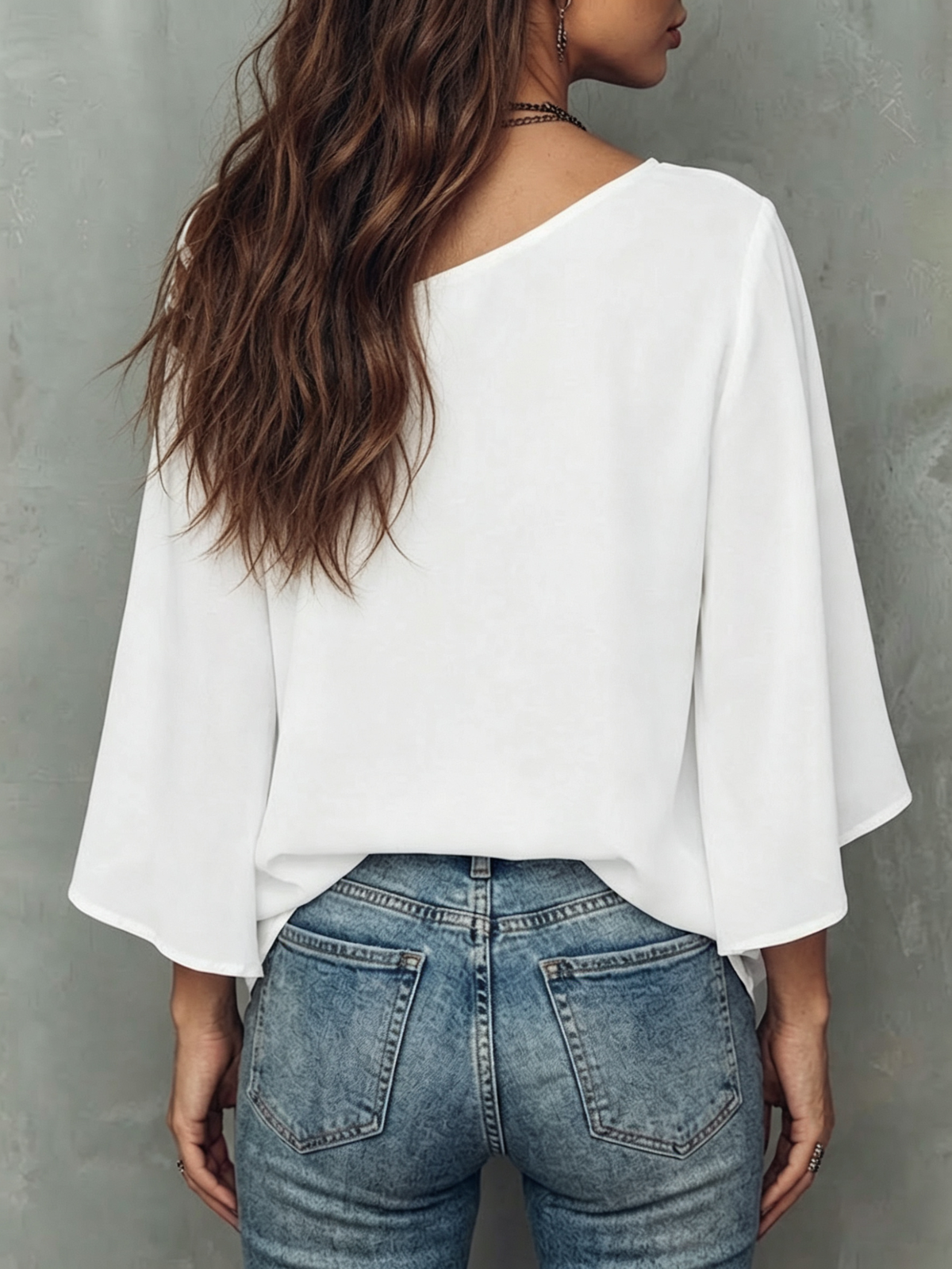 Loose-fit Top Featuring A Spliced asymmetrical Neckline, Abstract Line-art Face Graphic, Dropped Shoulders, And Flared Mid-length Sleeves